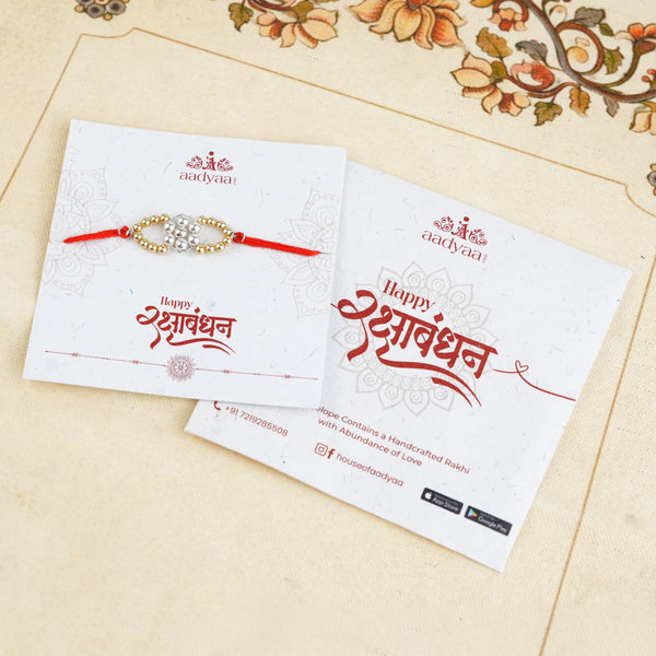 Golden & White Pearl Handmade Silver Rakhi