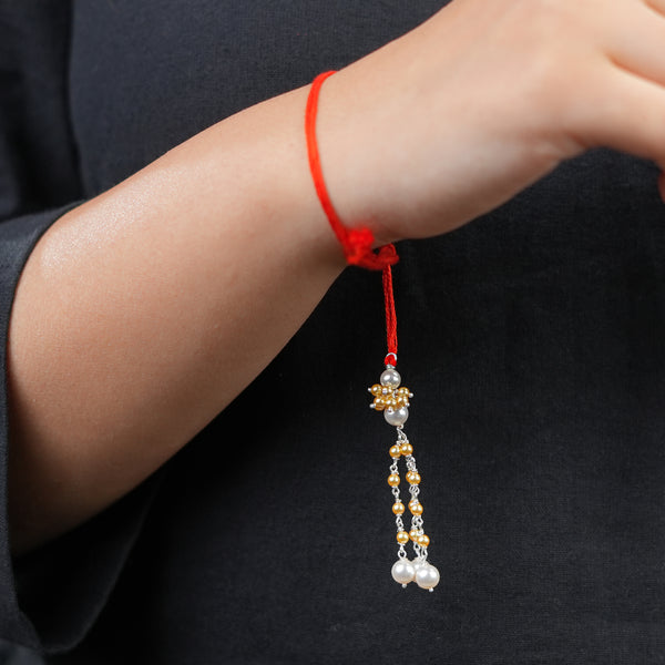 Golden & White Pearl Handmade Silver Lumba Rakhi