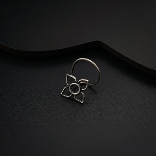 a close up of a ring on a black surface
