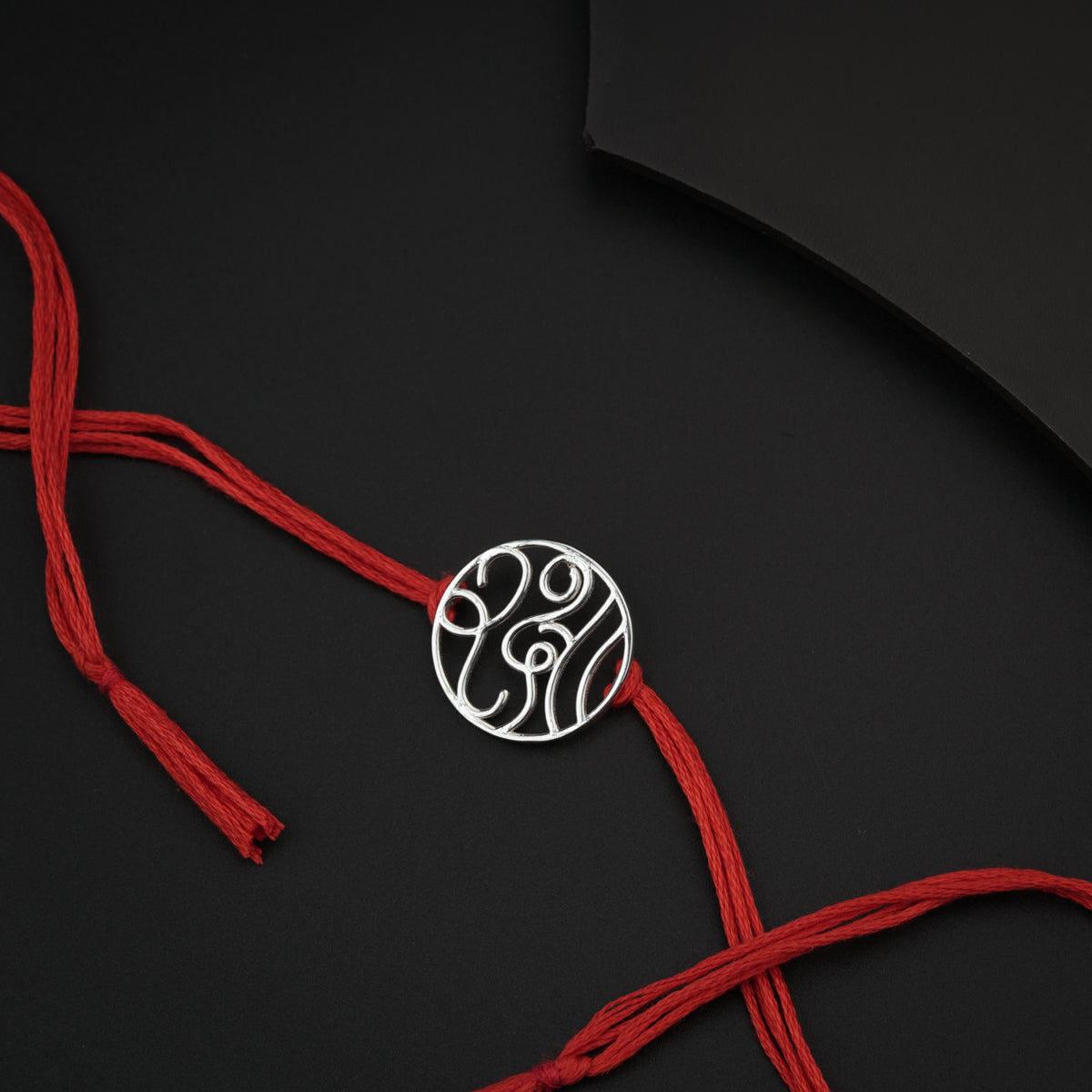 Handcrafted Silver Rakhi/Pendant: रक्षा (Raksha)