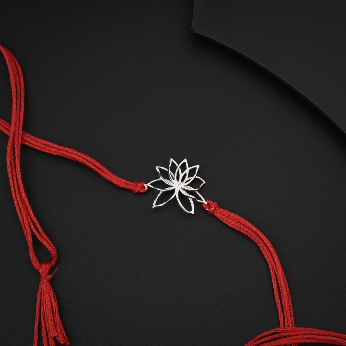 Handmade Silver Rakhi: Lotus