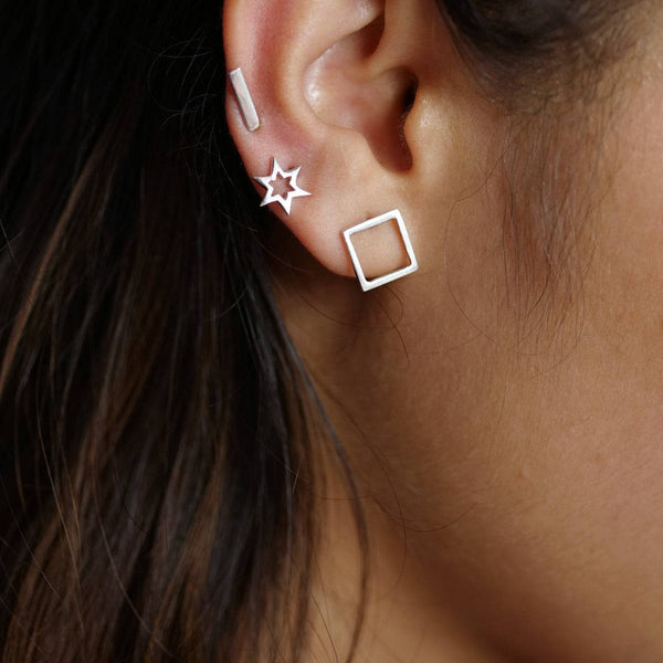 Geometric silver earrings set with star and square designs for women