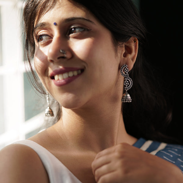 Silver statement filigree jhumki earrings with intricate design for women