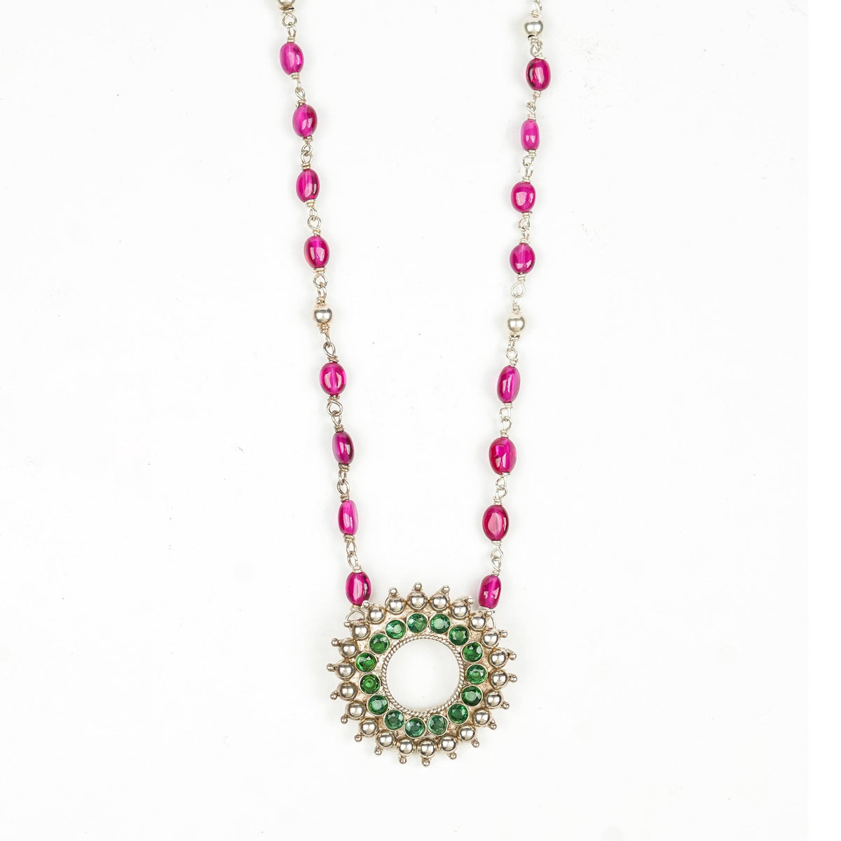 Close-up of Silver Karwar Motif Pendant & Ruby Ganthan Necklace showcasing intricate pendant detailing, rich ruby accents, fine ganthan work, and silver craftsmanship