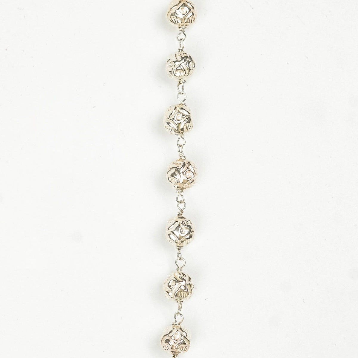 Angled view of Silver Mohanmaal Ganthan Necklace highlighting its layered bead arrangement, elegant structure, and traditional design