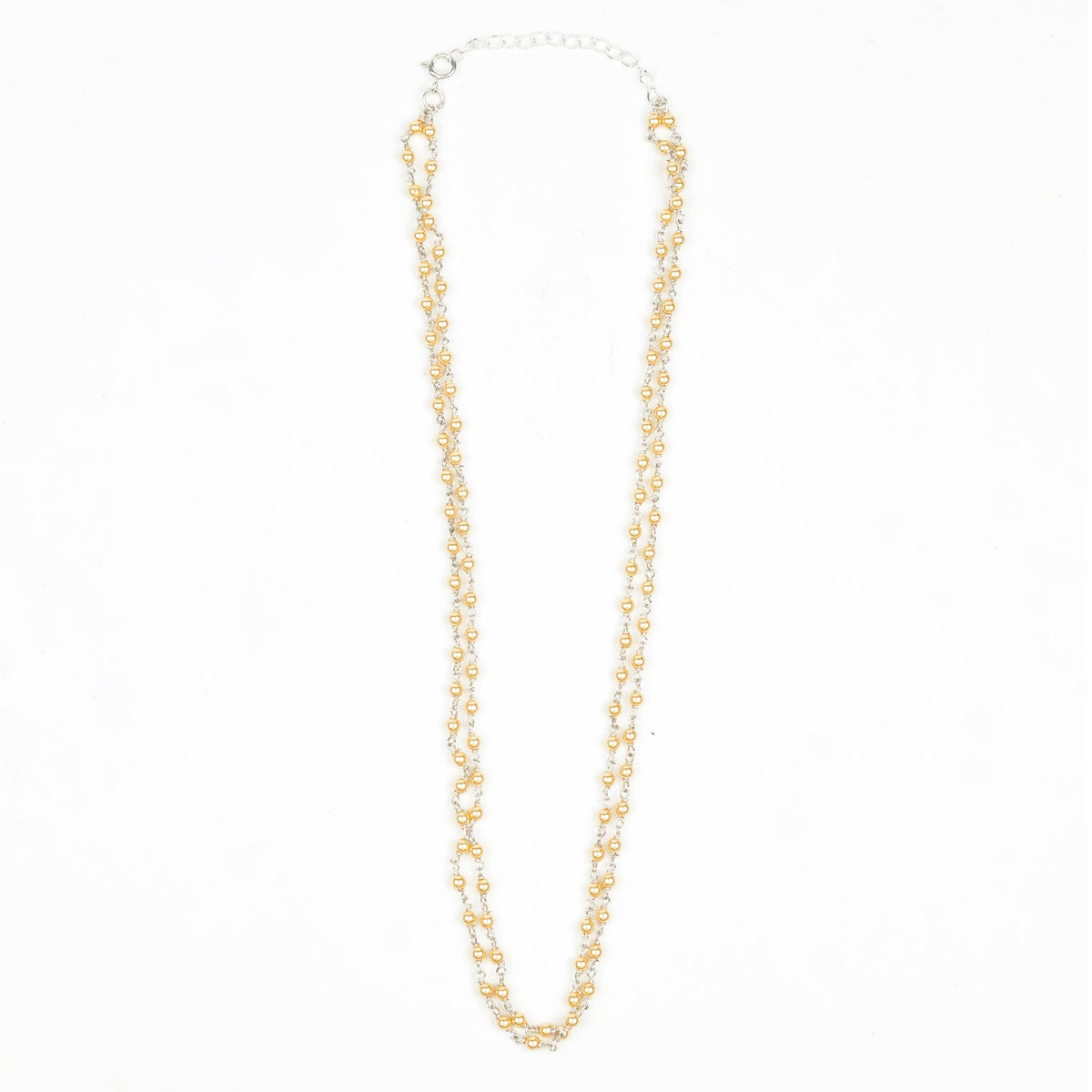 Detailed view of Silver Golden Pearl Ganthan Necklace highlighting the rich golden pearl tones, intricate detailing, and polished silver finish