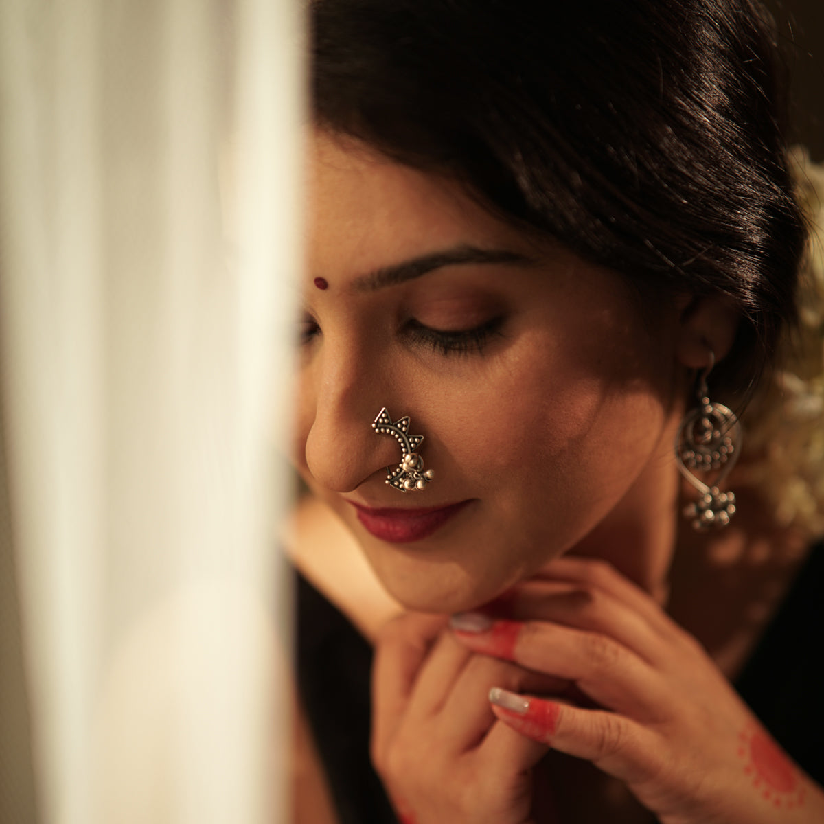 ghungroo detailing on silver nath