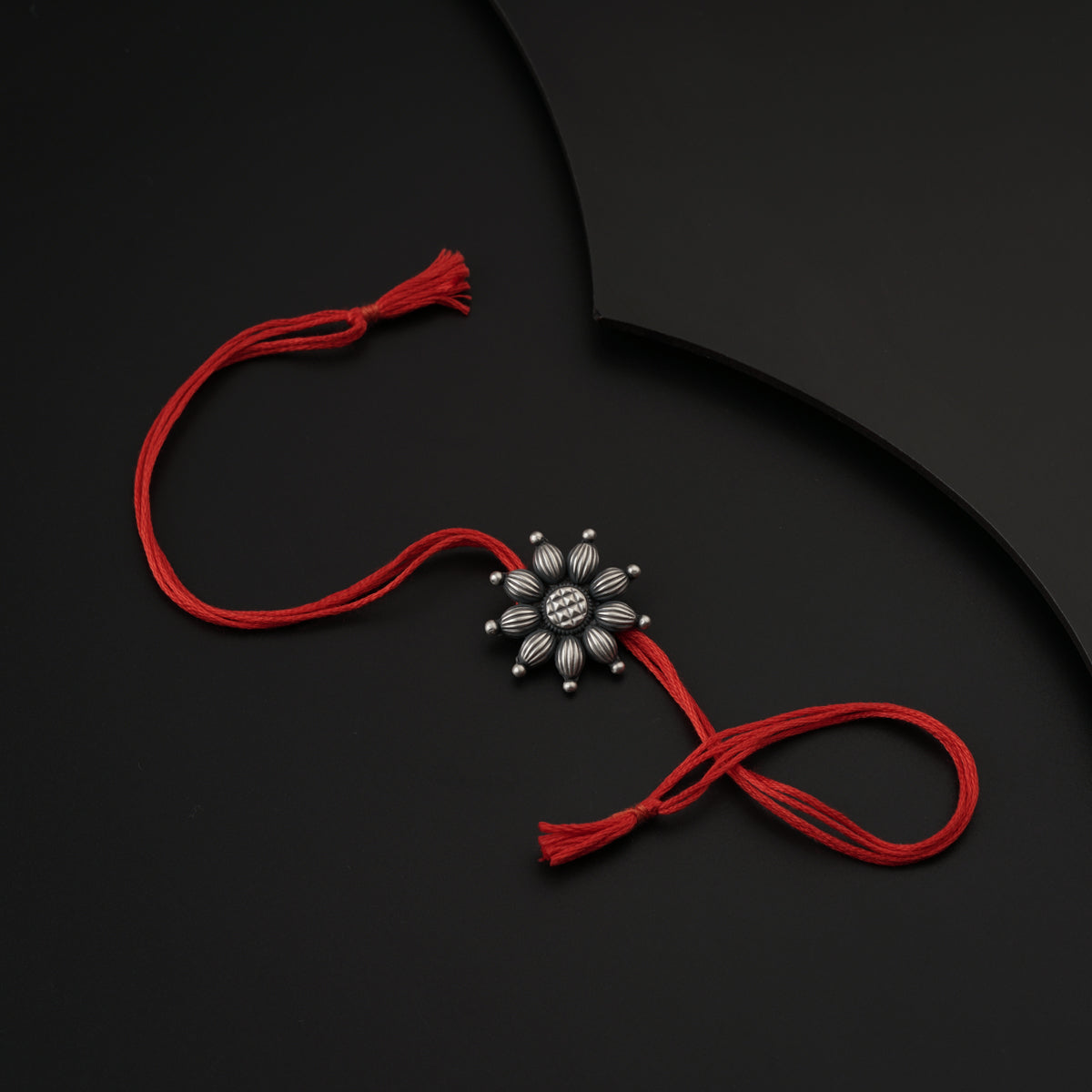 Handcrafted Silver Rakhi/Pendant: Big Flower