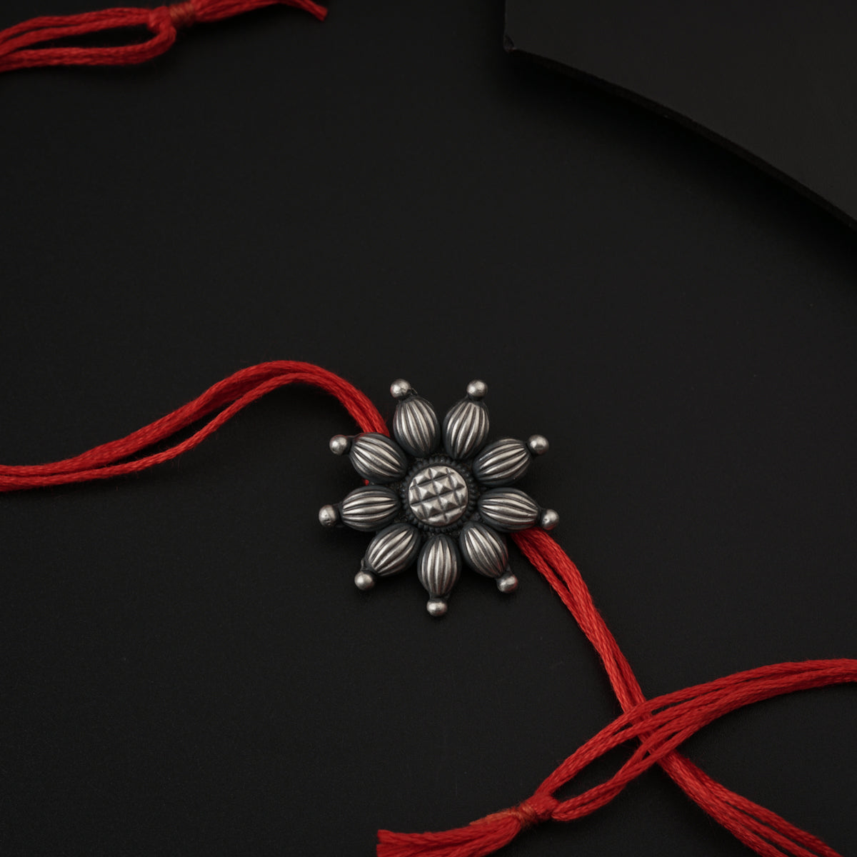 Handcrafted Silver Rakhi/Pendant: Big Flower