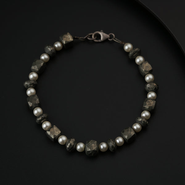 Semi precious stone bracelet in silver wire ( Pyrite and Pearls )