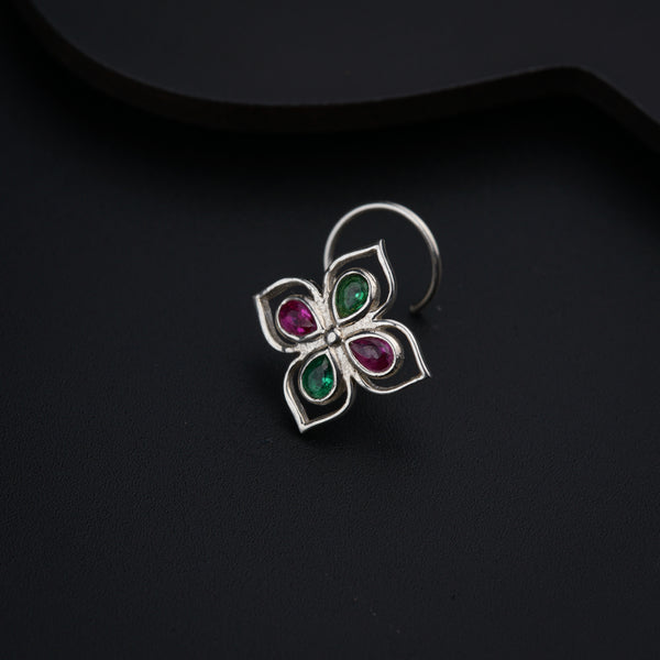 a close up of a ring on a black surface