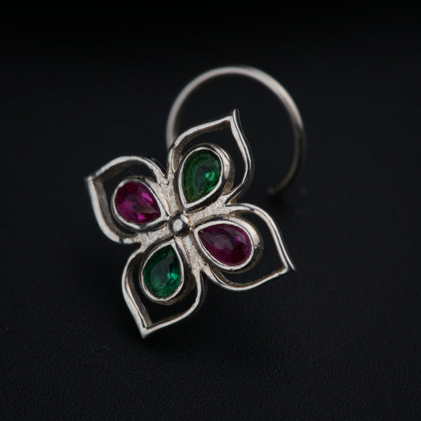 a close up of a ring on a black surface