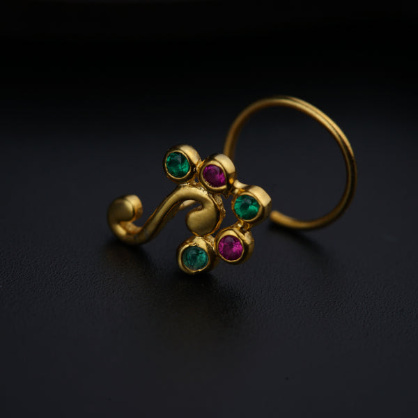 a close up of a ring on a black surface