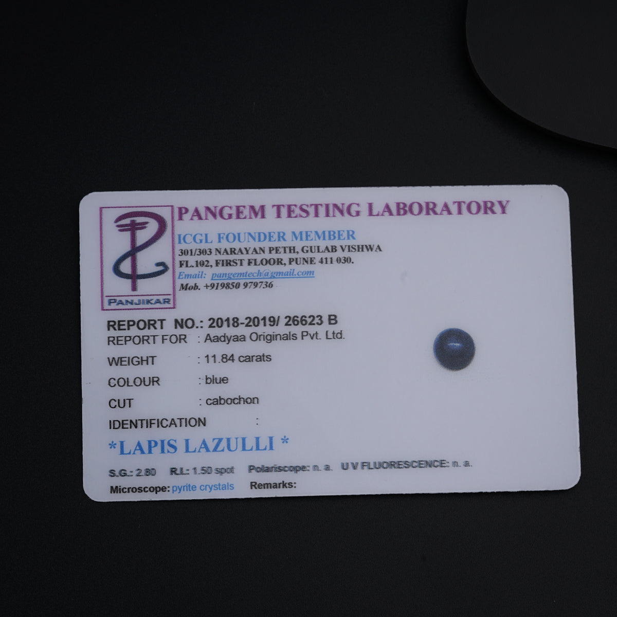 a tag on a table that says pangm testing laboratory