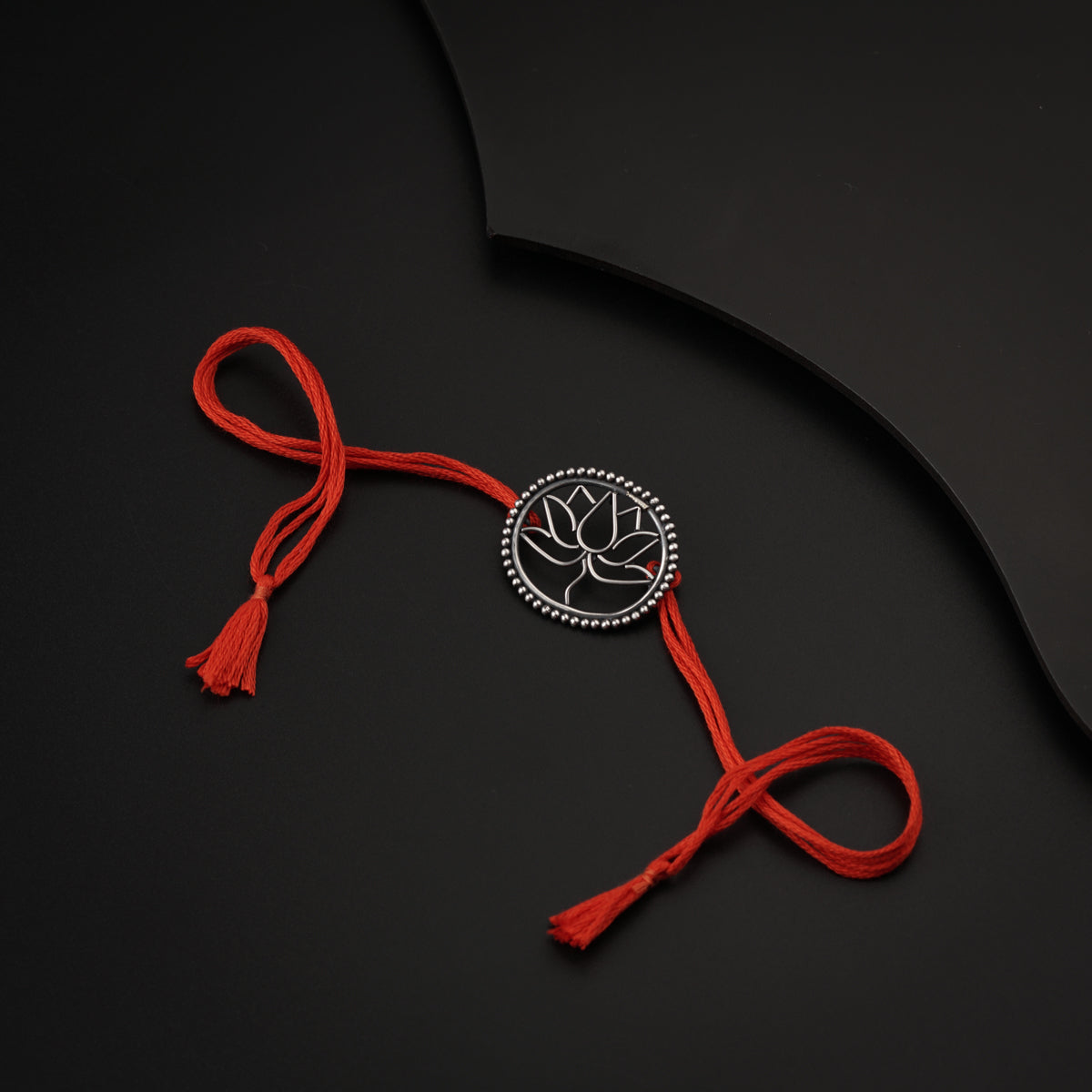 Handcrafted Silver Rakhi/Pendant: Lotus