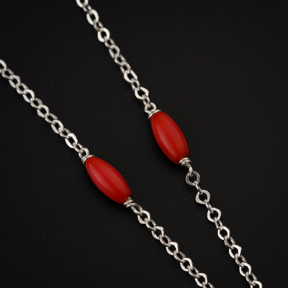Silver necklace with dholaki beads and corals