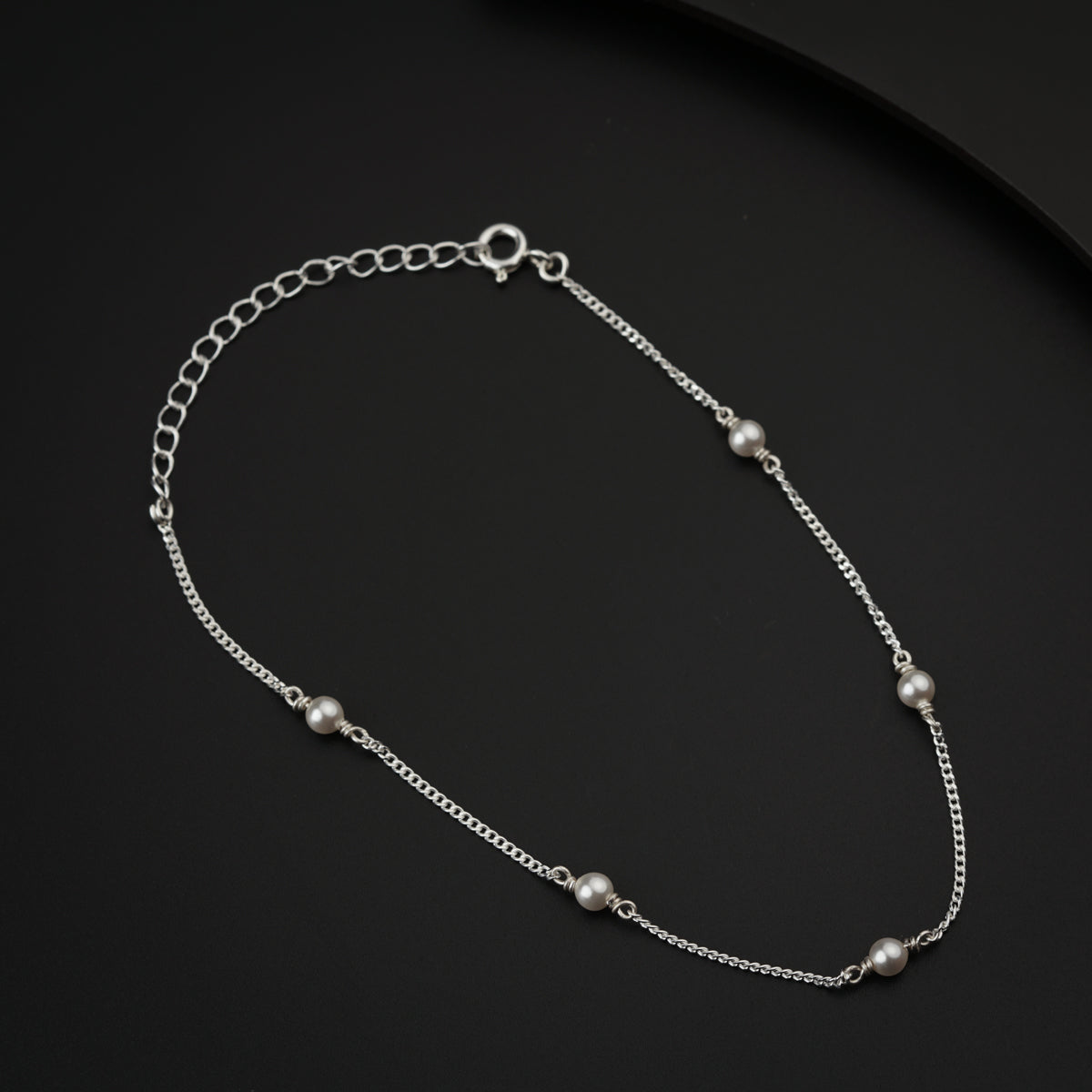 Pearl silver anklet showing delicate craftsmanship