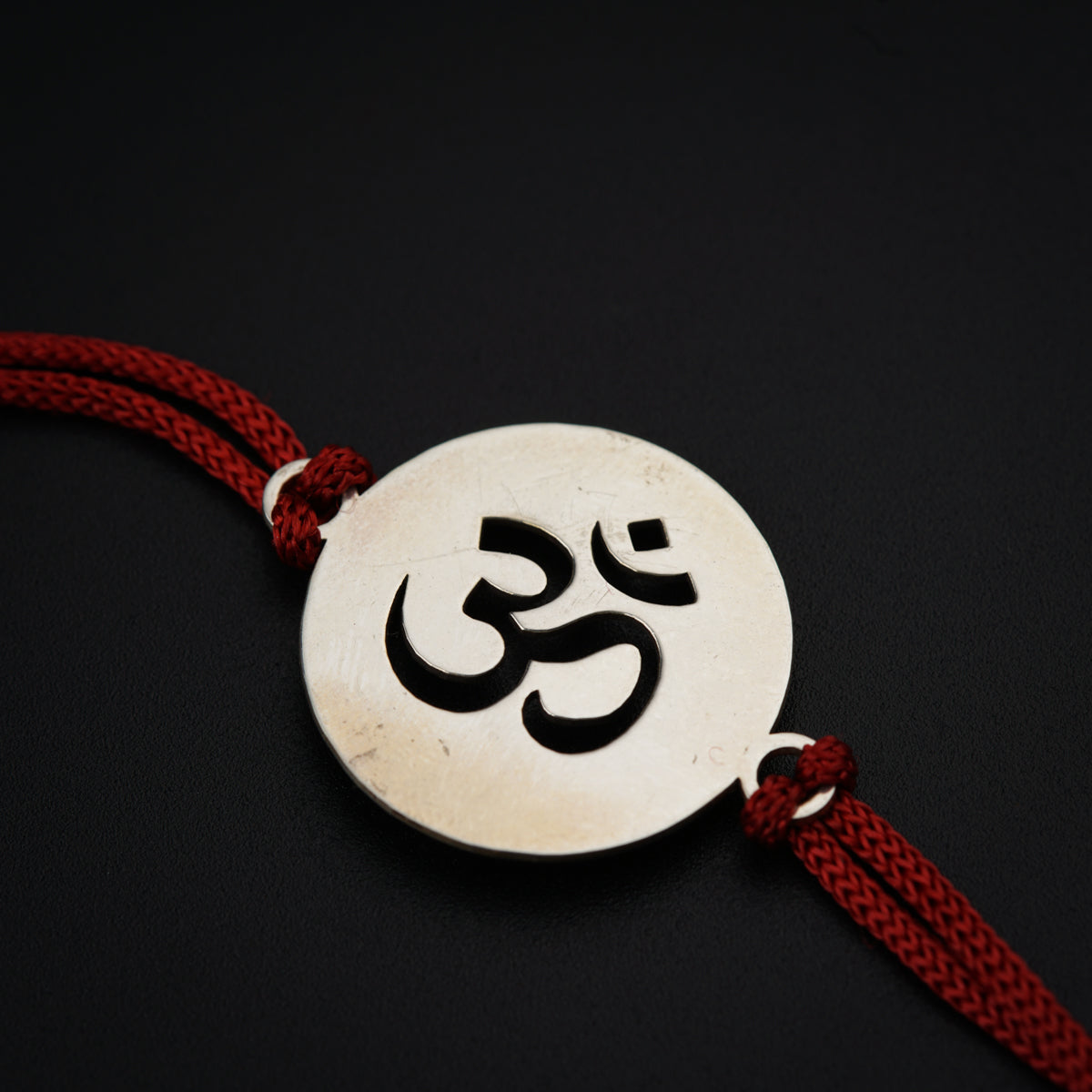 a bracelet with an omen symbol on it