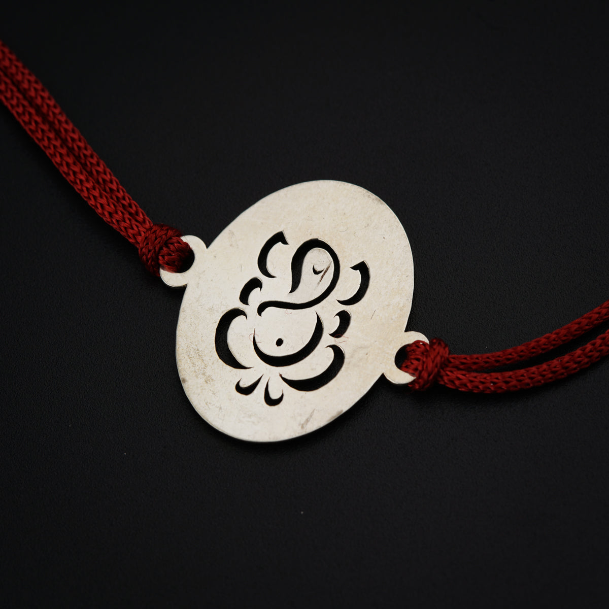 Handcrafted Silver Rakhi: Ganesh