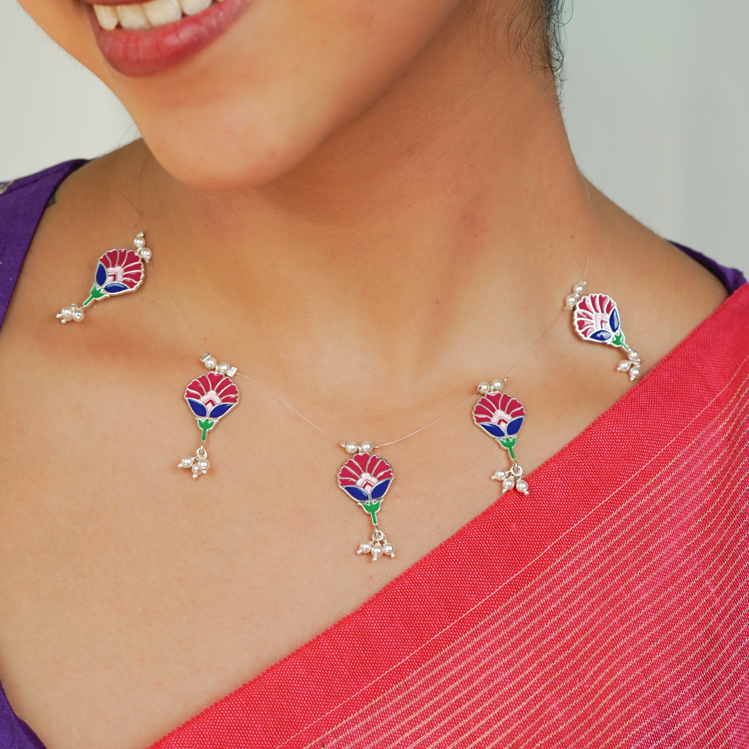 Meena charm set with invisible thread