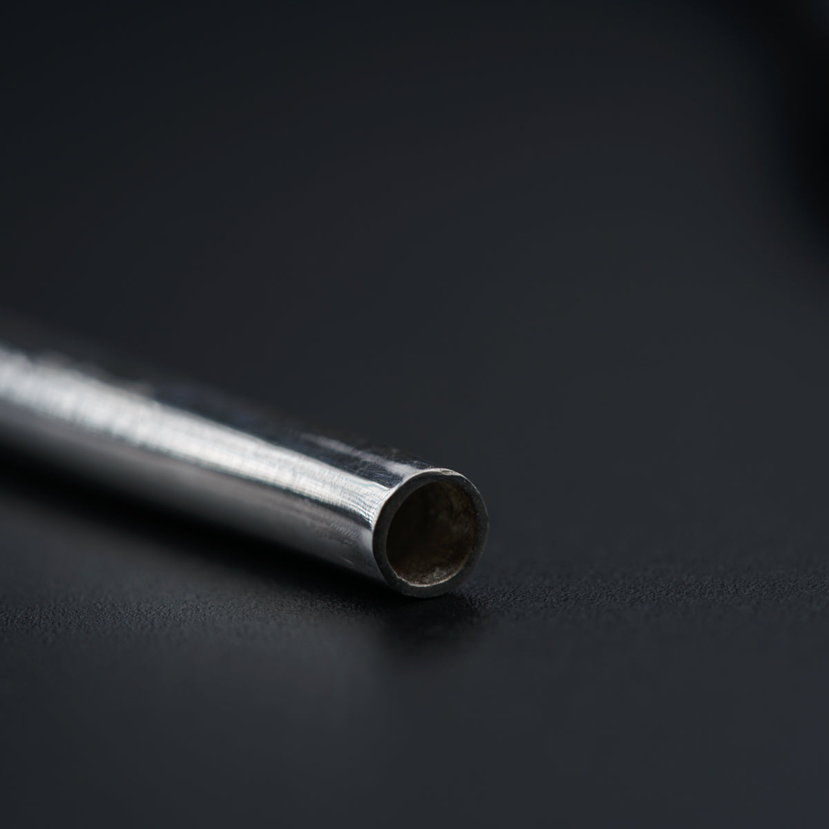 a close up of a metal object on a table
