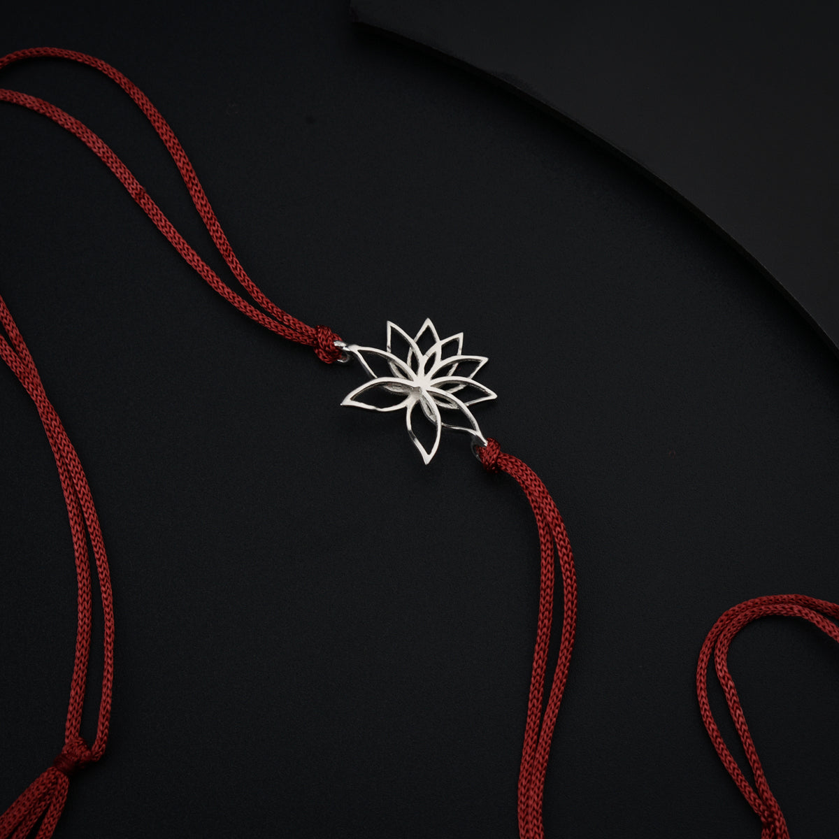 Handmade Silver Rakhi: Lotus