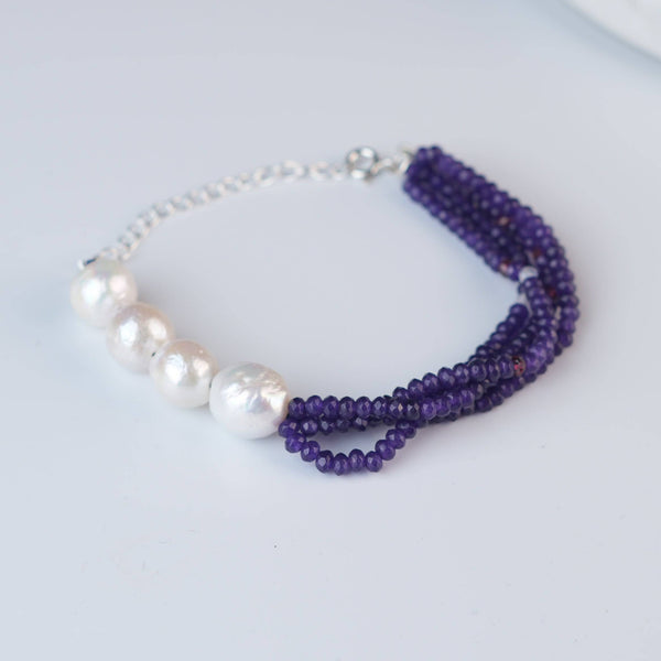 Angled view of Purple Jade & Baroque Pearl Silver Bracelet in 92.5 sterling silver with purple jade and baroque pearl detailing