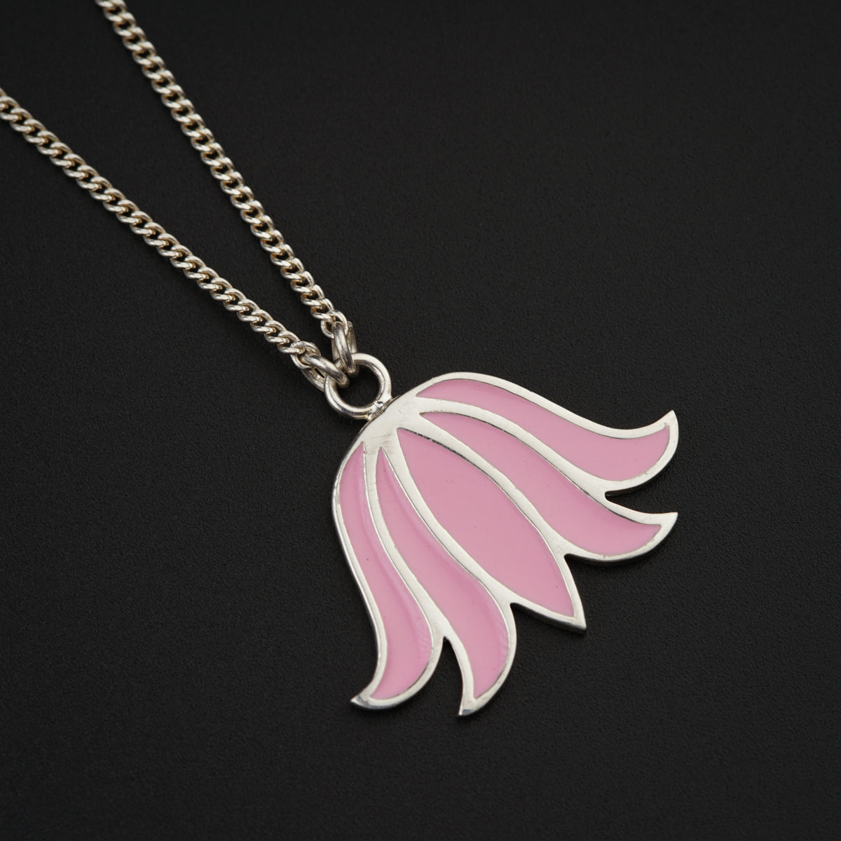 a necklace with a pink flower on a chain