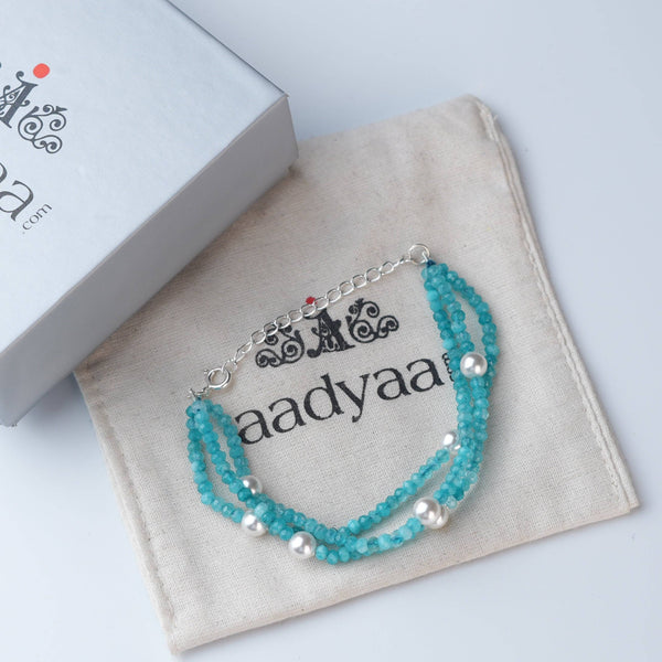 Detailed view of Blue Jade & Pearl Silver Bracelet highlighting natural blue jade stones, pearl accents, handcrafted silverwork, and polished finish