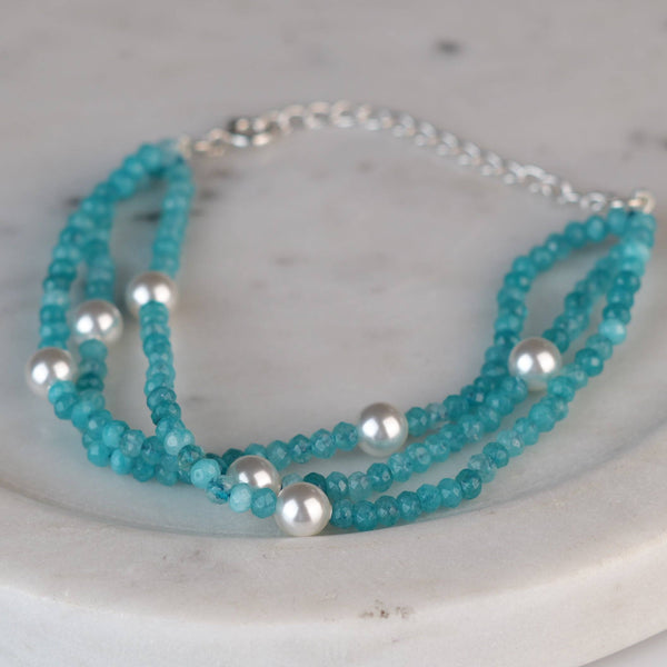 Close-up of Blue Jade & Pearl Silver Bracelet showcasing natural blue jade, lustrous pearls, and intricate handmade silver craftsmanship