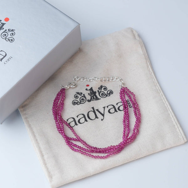 Detailed view of Ruby Silver Bracelet highlighting ruby gemstones, handcrafted silverwork, and polished silver finish