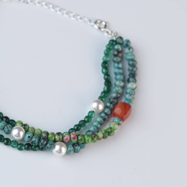 Close-up of Green Onyx, Pearl, Carnelian Cube, Green & Blue Jade Silver Bracelet showcasing natural gemstones, pearls, and intricate handmade silver craftsmanship