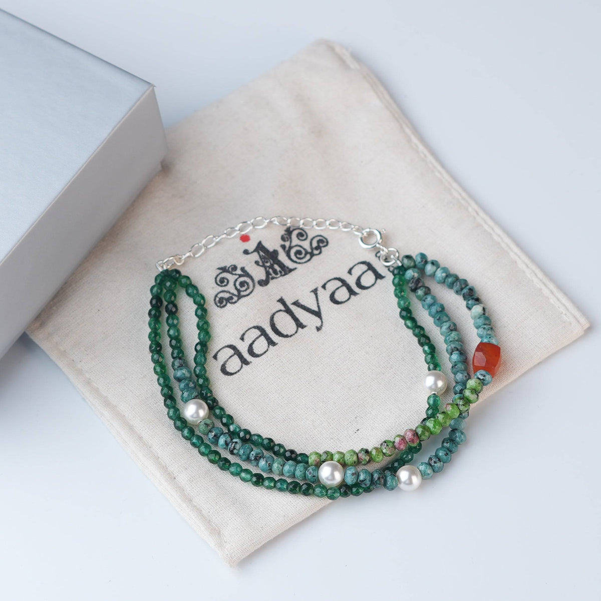 Detailed view of Green Onyx, Pearl, Carnelian Cube, Green & Blue Jade Silver Bracelet highlighting natural gemstones, pearl accents, handcrafted silverwork, and polished finish