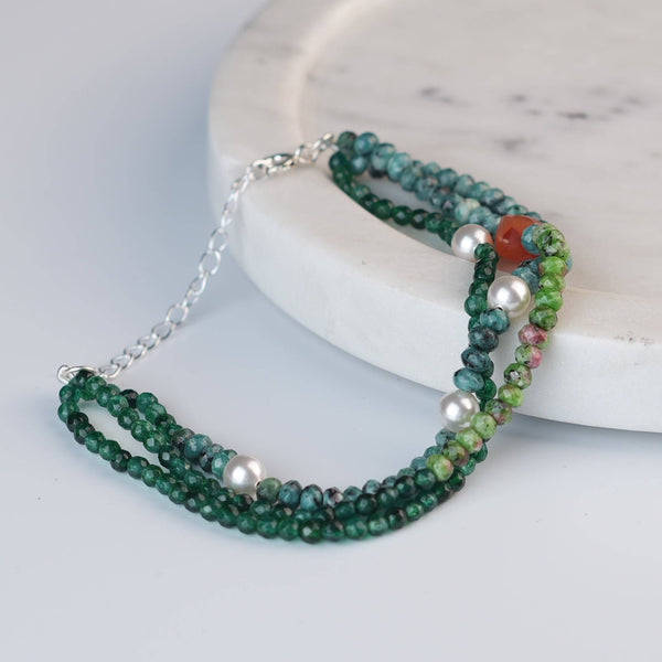 Angled view of Green Onyx, Pearl, Carnelian Cube, Green & Blue Jade Silver Bracelet in 92.5 sterling silver with multicolour gemstone detailing