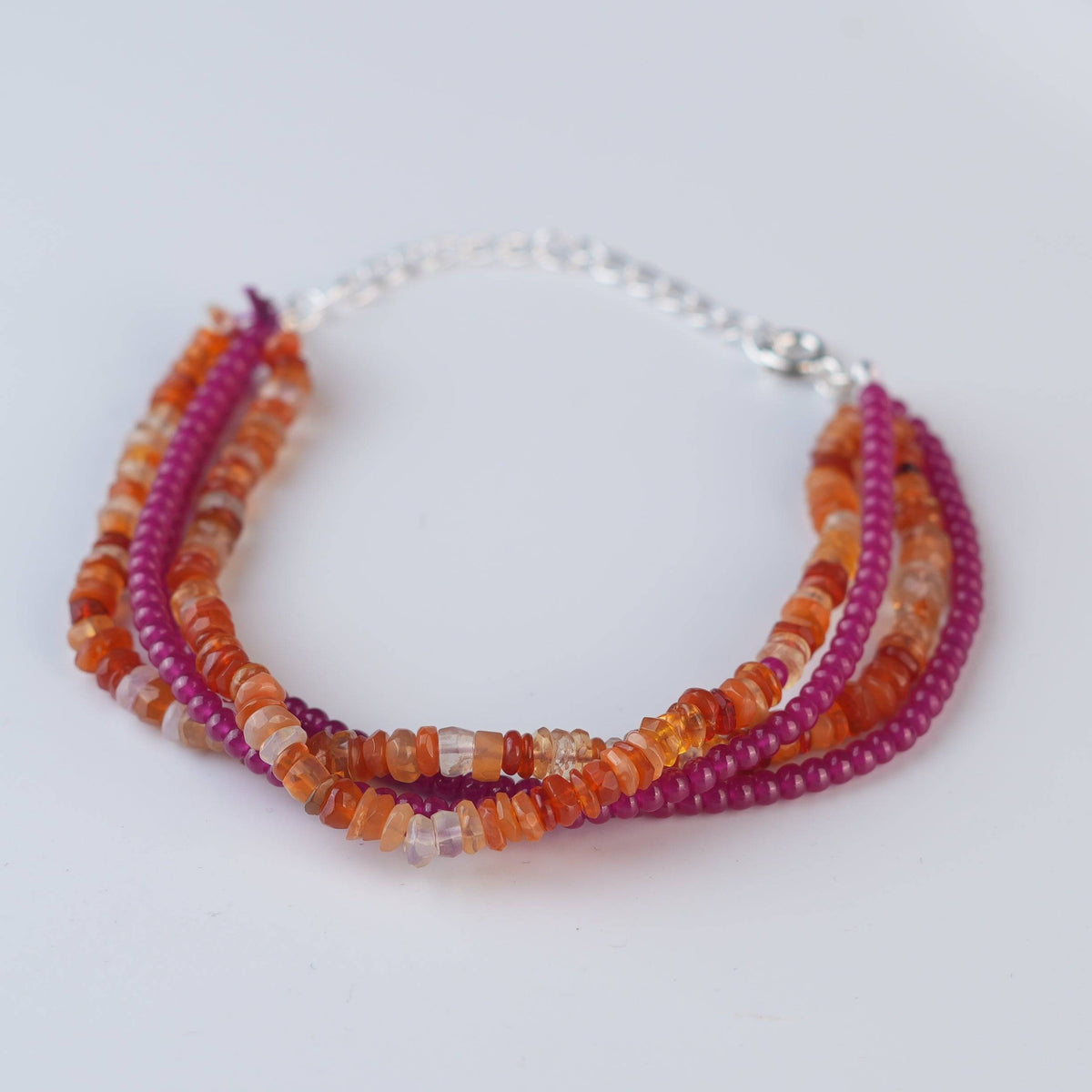 Close-up of Ruby & Carnelian Silver Bracelet showcasing ruby and natural carnelian stones with intricate handmade silver craftsmanship