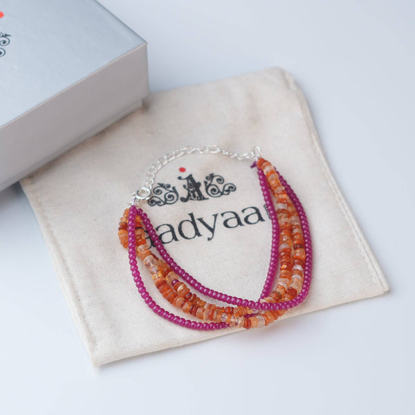 Detailed view of Ruby & Carnelian Silver Bracelet highlighting ruby accents, natural carnelian stones, handcrafted silverwork, and polished finish