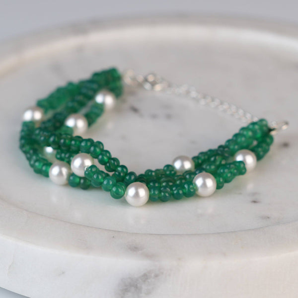 Close-up of Green Onyx & Pearl Silver Bracelet showcasing natural green onyx, lustrous pearls, and intricate handmade silver craftsmanship
