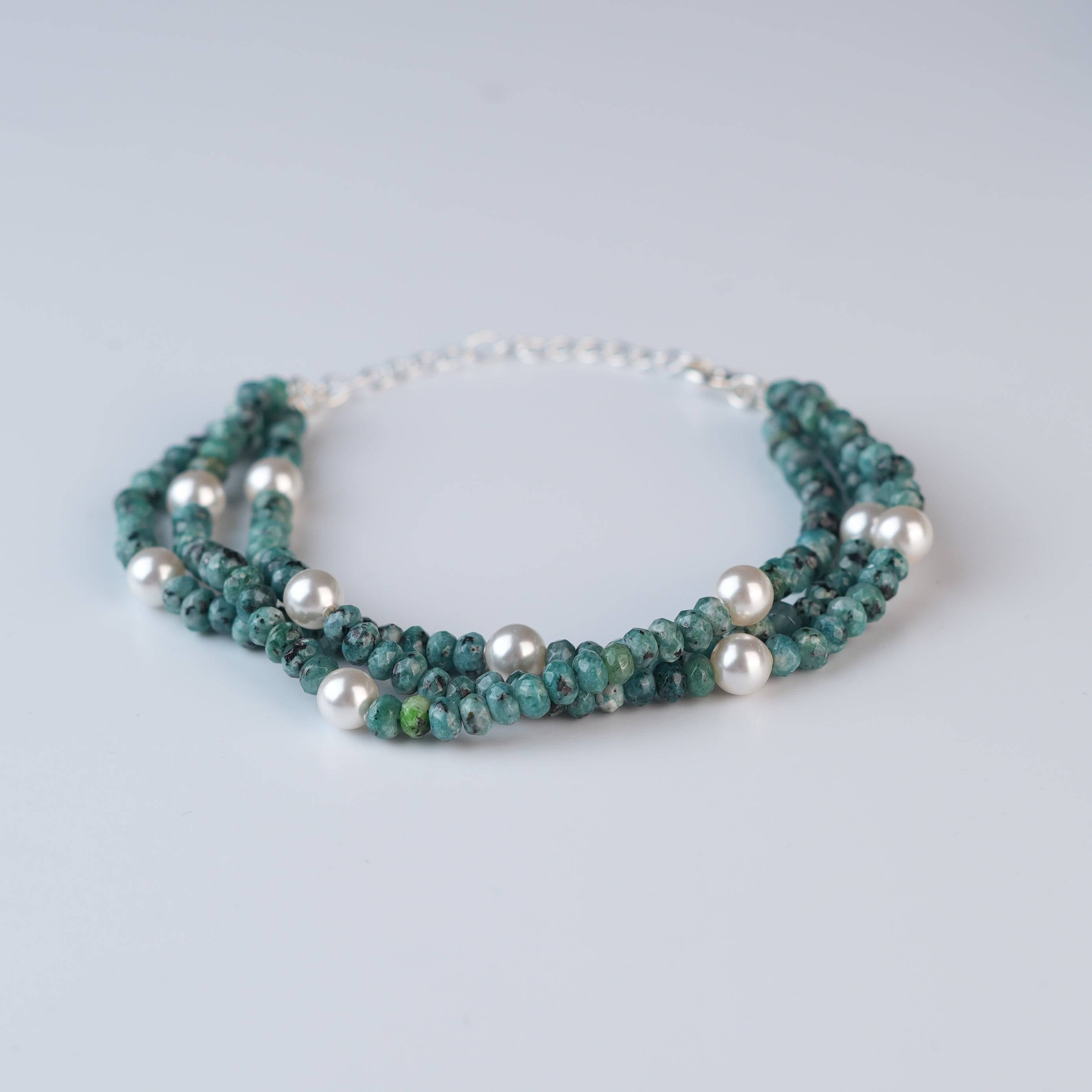 Close-up of Blue Jade & Pearl Silver Bracelet showcasing natural blue jade, lustrous pearls, and intricate handmade silver craftsmanship