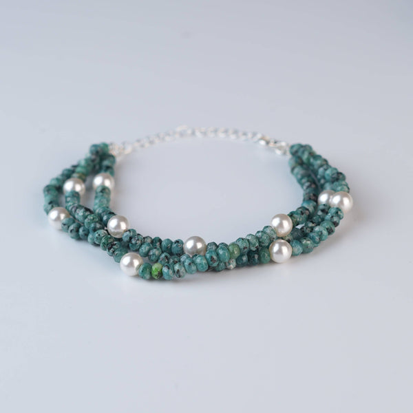 Close-up of Blue Jade & Pearl Silver Bracelet showcasing natural blue jade, lustrous pearls, and intricate handmade silver craftsmanship