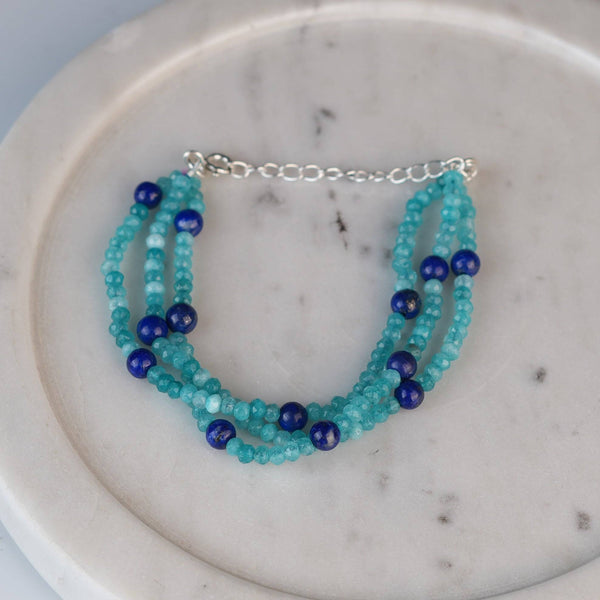 Angled view of Blue Jade & Lapis Lazuli Silver Bracelet in 92.5 sterling silver with blue gemstone detailing