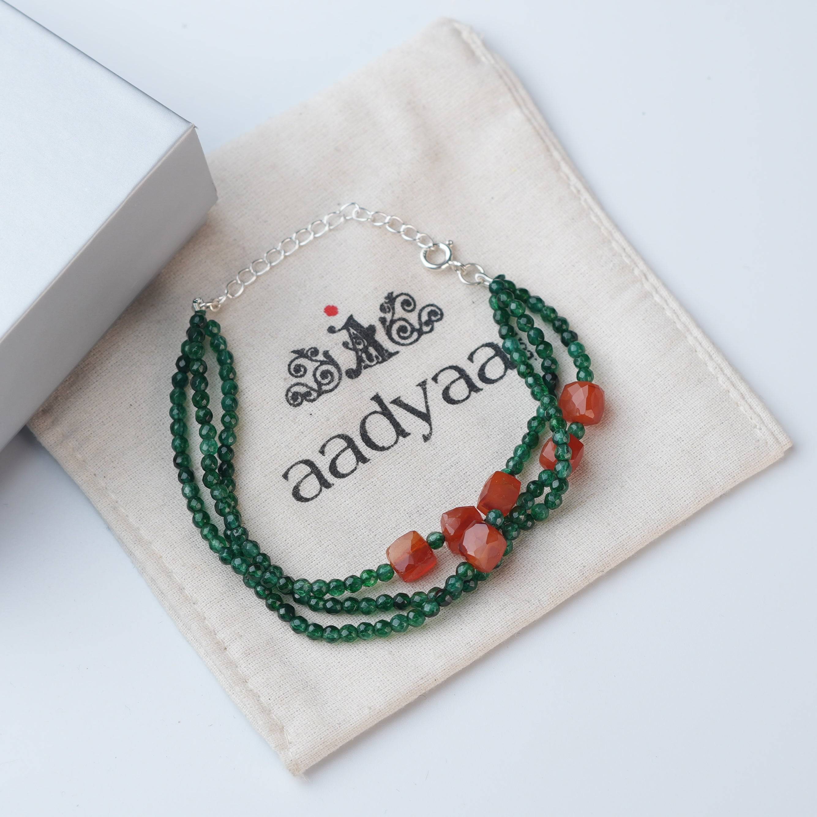 Detailed view of Green Onyx & Carnelian Silver Bracelet highlighting natural green onyx, carnelian stones, handcrafted silverwork, and polished finish