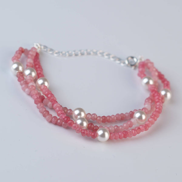 Close-up of Pink Jade & Pearl Silver Bracelet showcasing natural pink jade, lustrous pearls, and intricate handmade silver craftsmanship