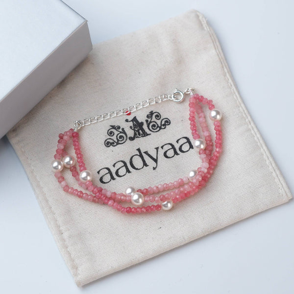 Detailed view of Pink Jade & Pearl Silver Bracelet highlighting natural pink jade stones, pearl accents, handcrafted silverwork, and polished finish