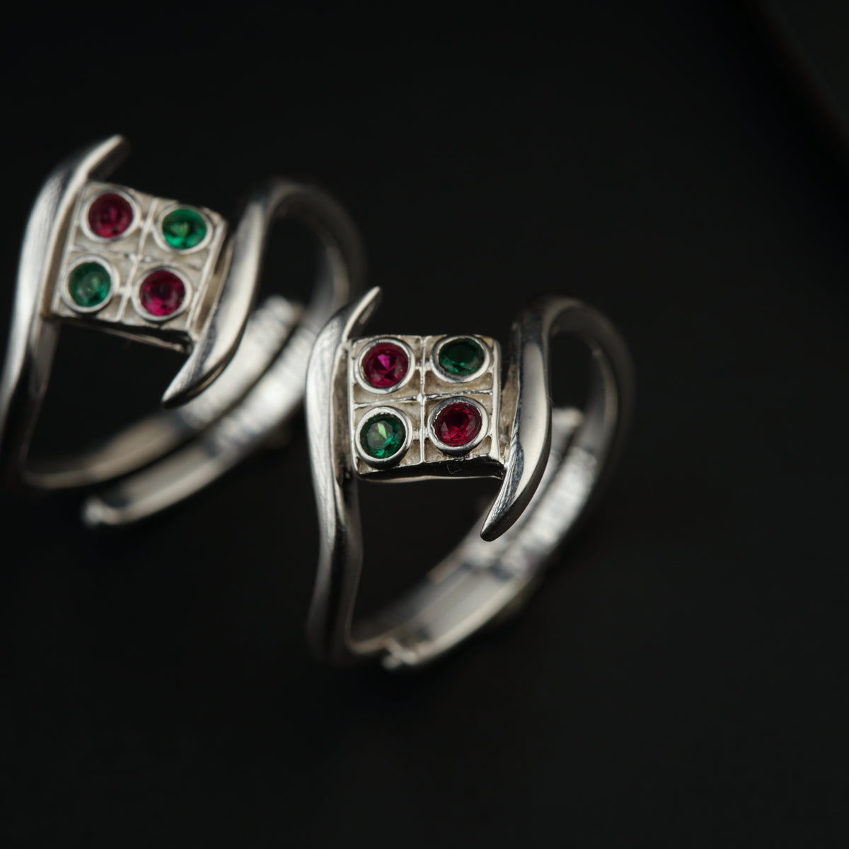 a couple of rings sitting on top of a table