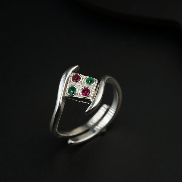 a close up of a ring on a black surface