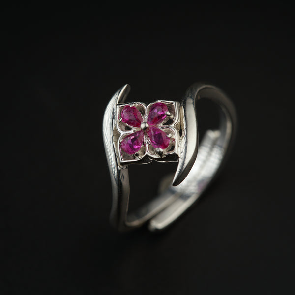 a close up of a ring on a black surface