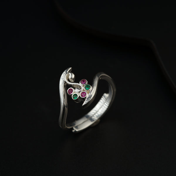 a close up of a ring on a black surface