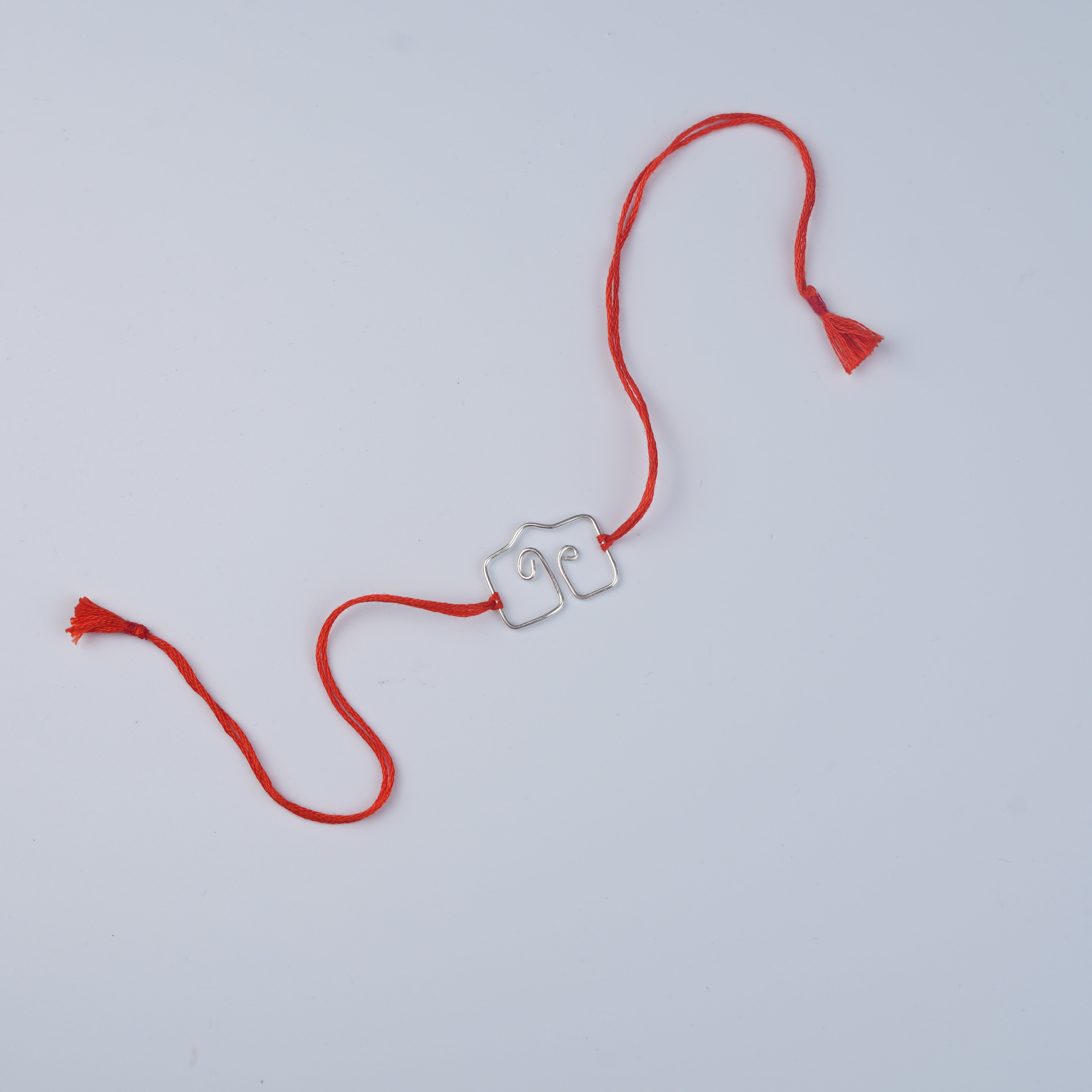 Silver Wire Bent Rakhi (Project Handmade)