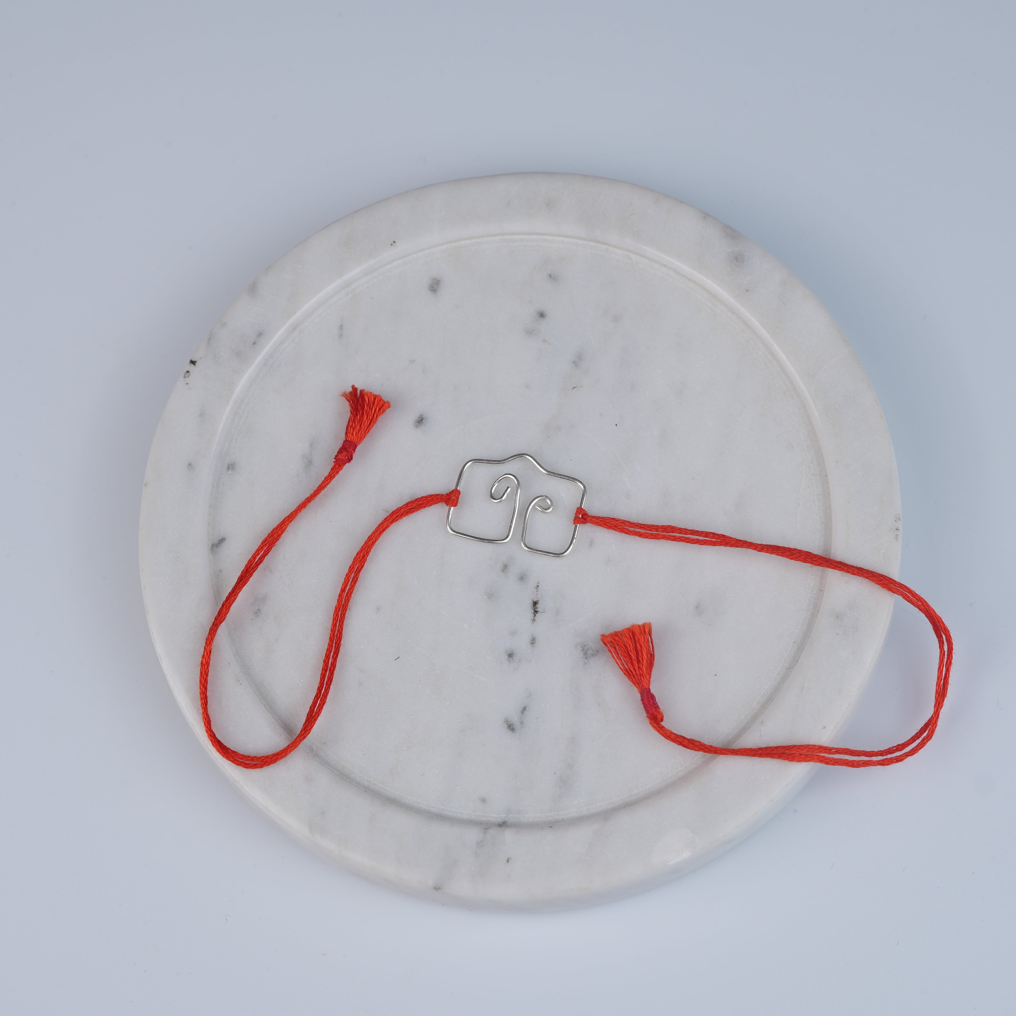 Silver Wire Bent Rakhi (Project Handmade)