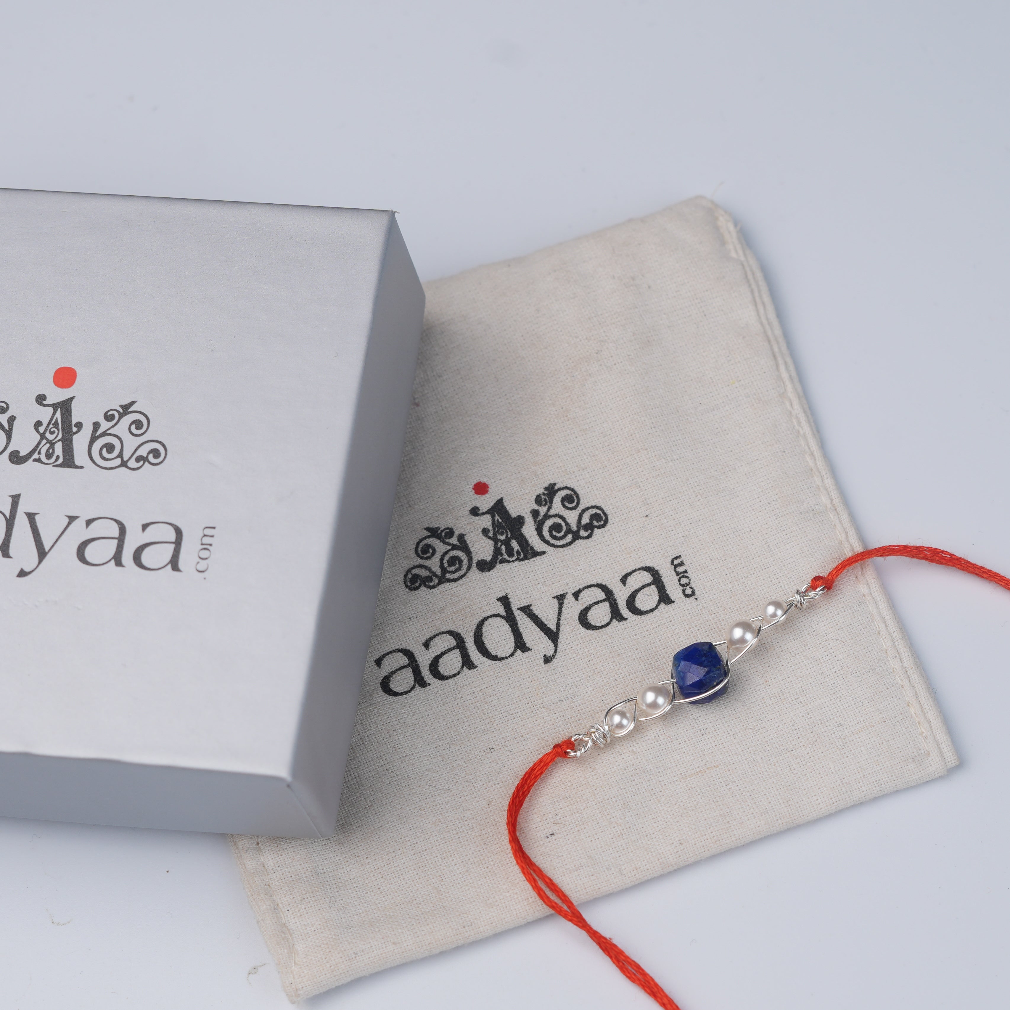 Lapis Lazuli & Pearl Wrapped Rakhi (Project Handmade)